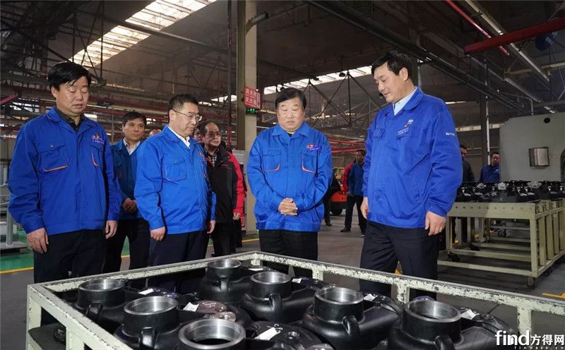 谭旭光深入陕重汽慰问